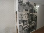 Mural de fotos das casas construídas no tempo da imigração